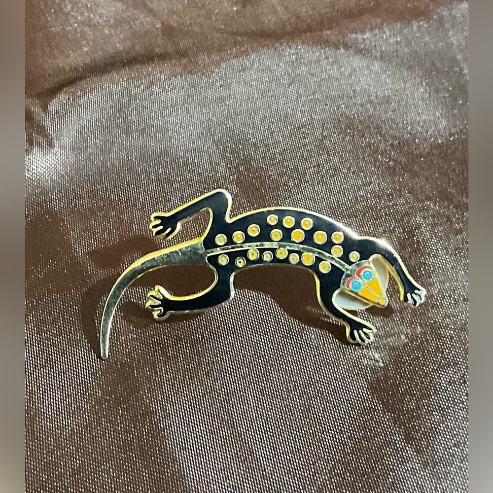 This is a vintage Laurel Burch cloisonné lizard brooch